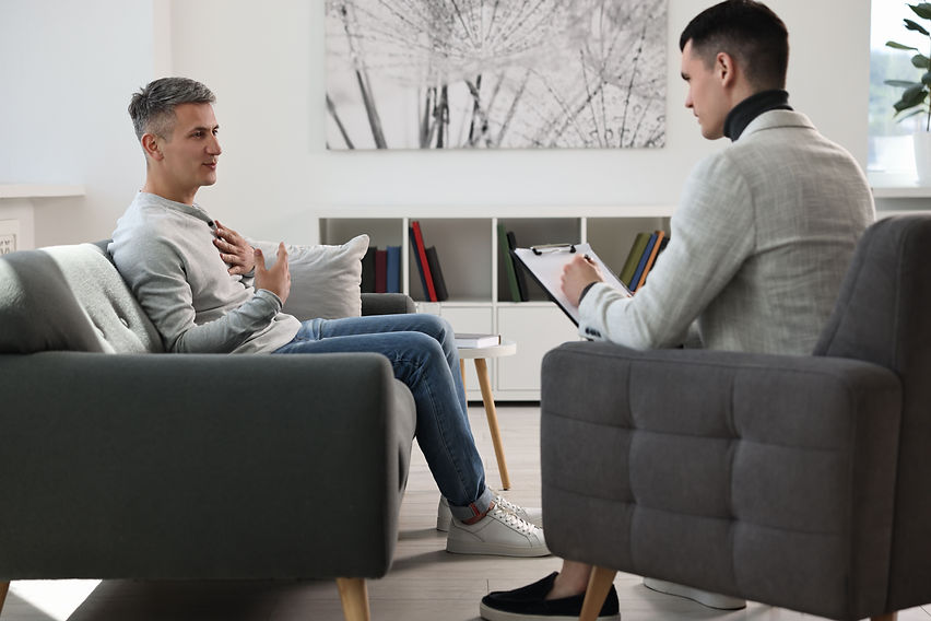 professional-psychotherapist-working-with-patient-office.jpg