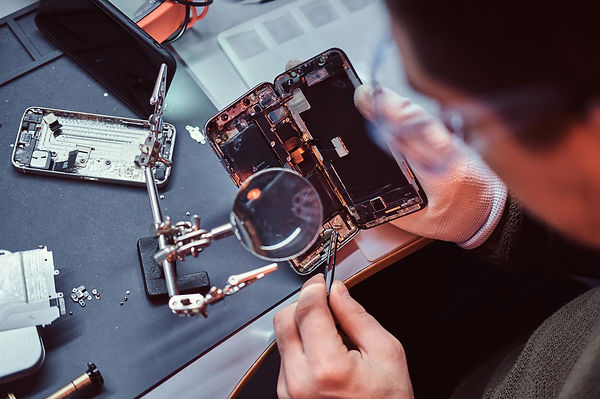 repairman-uses-magnifier-tweezers-repair-damaged-smartphone-close-up-photo-disassembled-sm