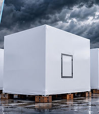 Wrapped industrial equipment protected during outdoor staging and storage
