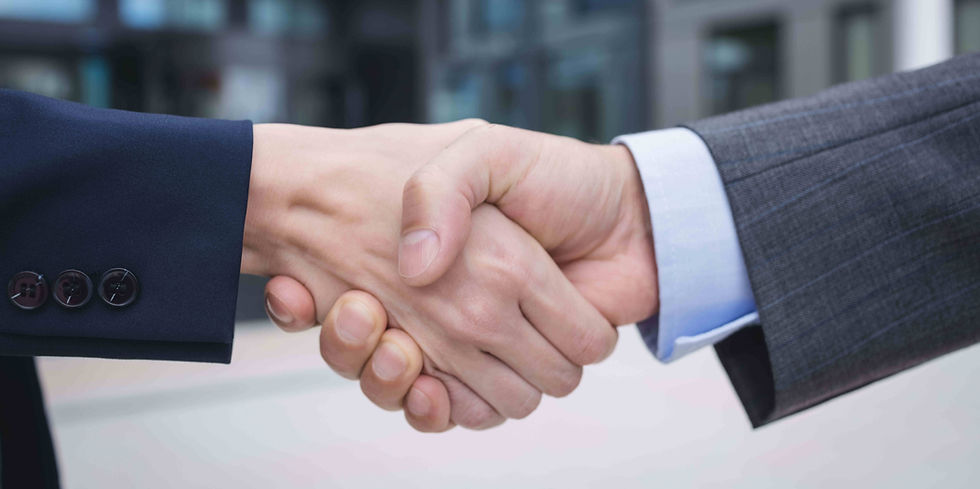 businesspeople-shaking-hands (1)_edited_edited.jpg