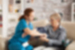 female-nurse-using-digital-blood-pressure-device-senior-woman-nursing-home.jpg