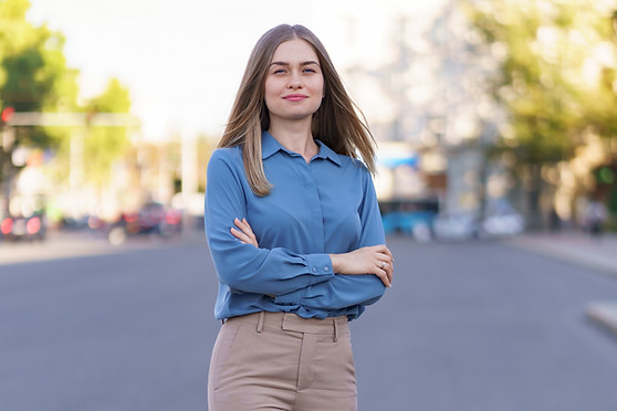 shot-beautiful-young-businesswoman-wearing-blue-chifon-shirt-while-standing-street-with-fo