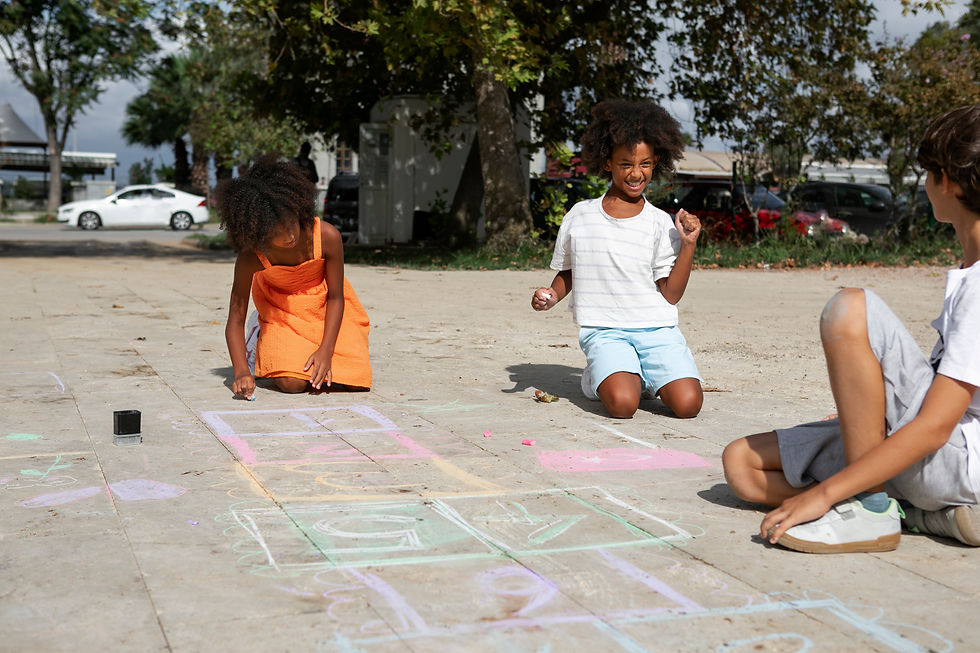 kids-drawing-pavement-full-shot.jpg