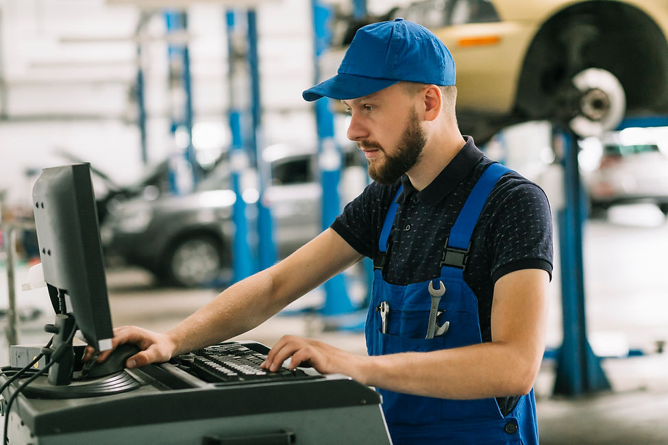 repairmen-using-computer-workshop.jpg