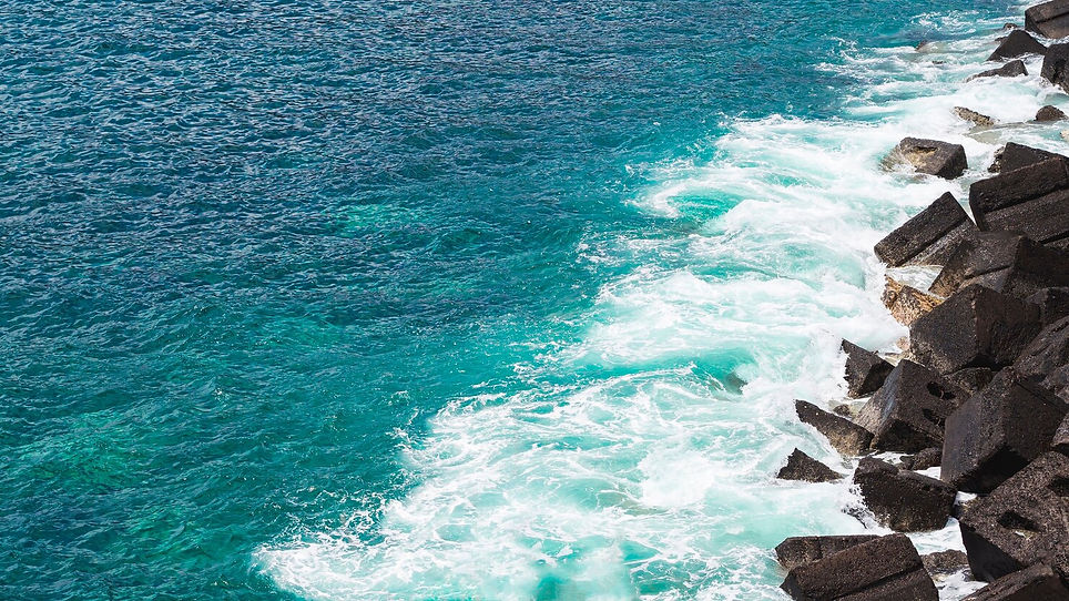 close-up-wavy-water-rocky-seashore_23-2148229817.jpg