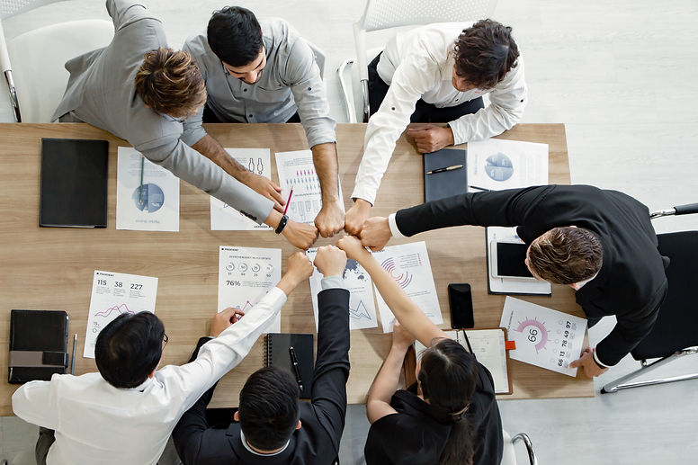 top-view-join-hands-team-asian-people-foreigners.jpg