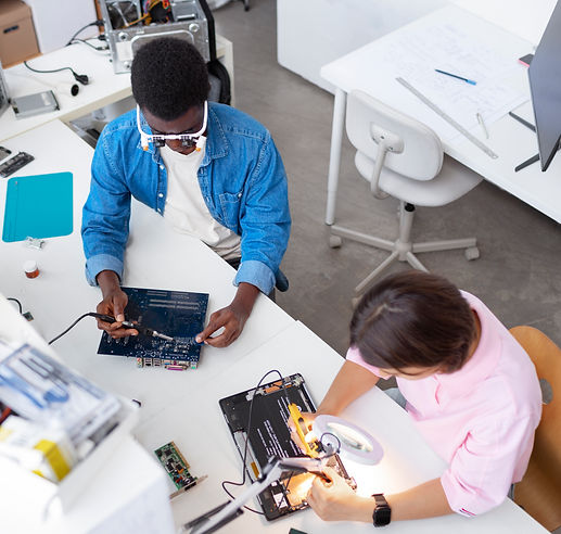 people-repairing-computer-chips