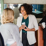 businesswomen-talking-each-other.jpg