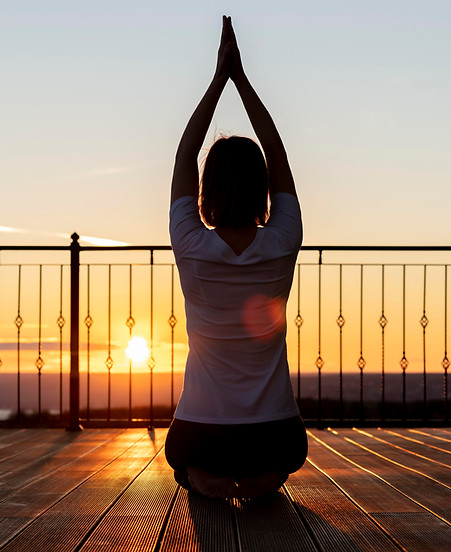 full-shot-woman-meditating-outdoors.jpg