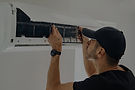 air_conditioner_maintenance_male_technician_repairing_cooling_system_edited.jpg