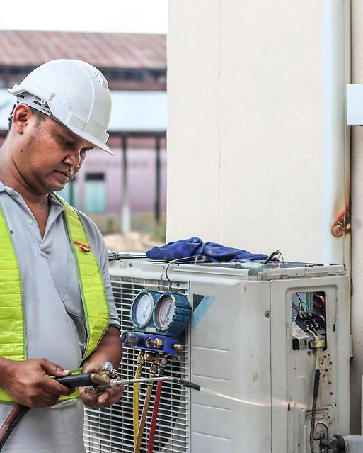 professional-electrician-man-is-fixing-heavy-air-conditioner-model-is-actual-repairman-ele