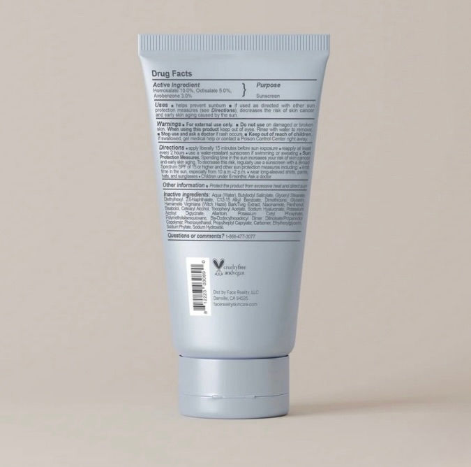 Face Reality Daily SPF 30 Plus packaging back - with acne-clearing support benefits.