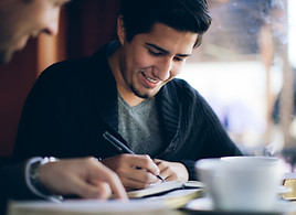 Men studying the Bible together in a DNA group