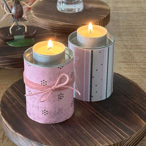 Frühlingsdeko Teelichthalter selbstgebastelt aus leeren Teedosen mit rosafarbenem Dekopapier