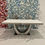 Thumbnail: CRESCENT SILVER DINING TABLE