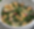 warm tempeh over a kale and radish salad