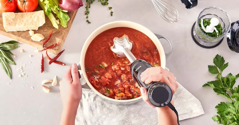 blending soup with an immersion blender