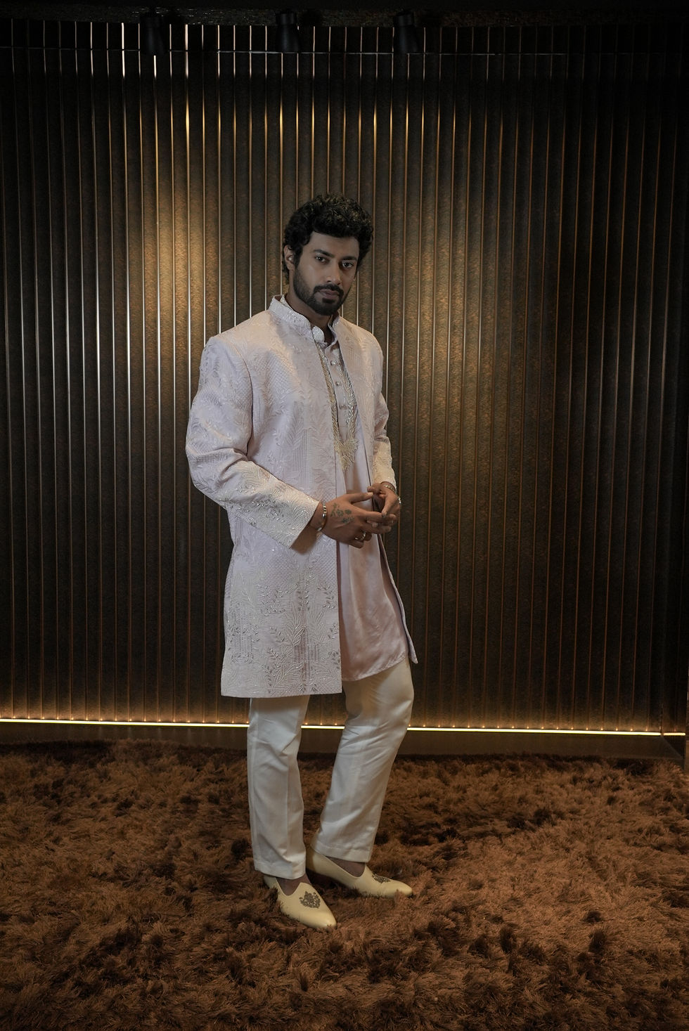Bespoke ivory embroidered Indo-western for men in Hyderabad with precision tailoring, designed for weddings.