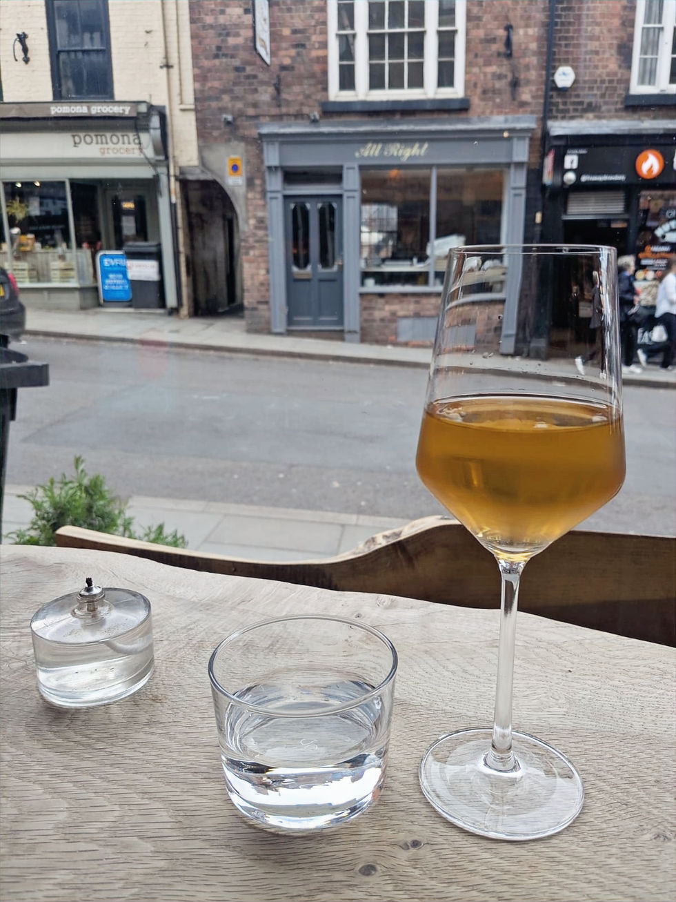 Orange wine looking out onto the quaint streets of Shrewsbury
