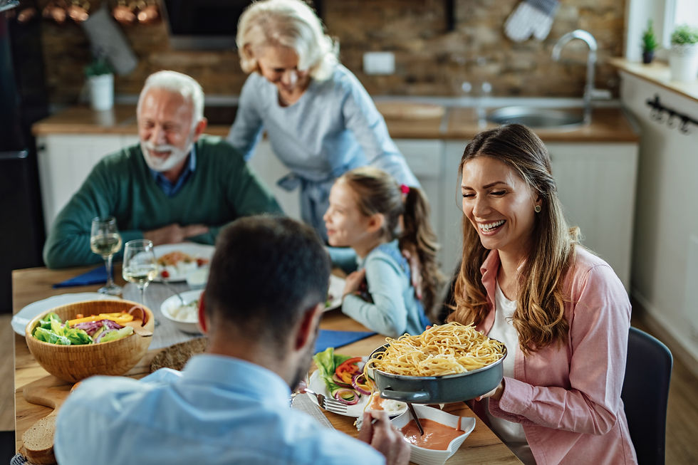 young-happy-woman-laughing-while-passing-food-her-husband-enjoying-family-lunch-dining-tab