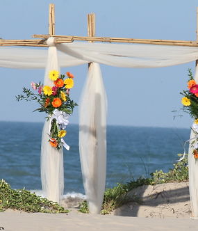on our beach location few people,ceremony set up