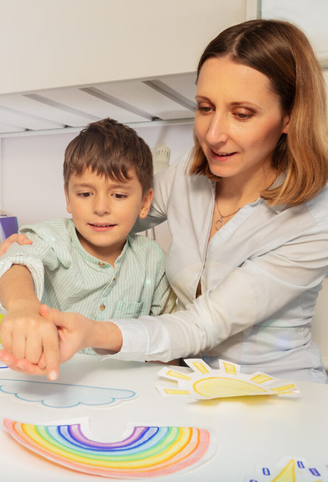 therapist-teaching-autistic-boy.jpg