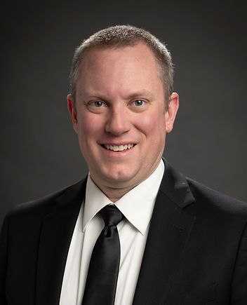 Brian Margrave is the Director of Bands at Cheyenne Mountain Junior High School in Colorado Springs, Colorado. He began his teaching career in 2007 with a focus on elementary band programs and is proud to have taught at all seven schools in Cheyenne Mountain School District 12. In 2022, Margrave transitioned to the role of Director of Bands at Cheyenne Mountain Junior High. Under his leadership, the CMJH Symphonic Band was selected to perform at the 2024 Colorado Music Educators Association Conference.

Margrave earned his Bachelor of Music Education degree from the University of Colorado in 2007 and a Master’s degree from the American Band College at Sam Houston State University in 2010. He is a National Board Certified Teacher and the recipient of the Outstanding Young Bandmaster Award from the honorary band fraternity Phi Beta Mu (Kappa Chapter), which he received in 2015. He currently serves Phi Beta Mu as Secretary and Treasurer.

Beyond his work at Cheyenne Mountain Junior High, Margrave is deeply involved in music education throughout the region. He serves as President and Concert Band Coordinator for the Pikes Peak Middle School Honor Band and is frequently invited to serve as a clinician and adjudicator across Colorado. He is passionate about supporting young musicians at every stage of their development and values collaboration between school programs and youth music organizations.

Outside of the classroom, Margrave enjoys spending time with his wife, Kate Margrave, Director of Bands at Pine Creek High School. Together, they are the proud parents of their daughter, Eva May. The Margrave family shares a love for the outdoors and can often be found exploring the natural beauty of Colorado.