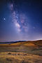 brown-green-grass-field-blue-sky-with-stars-night-time.jpg