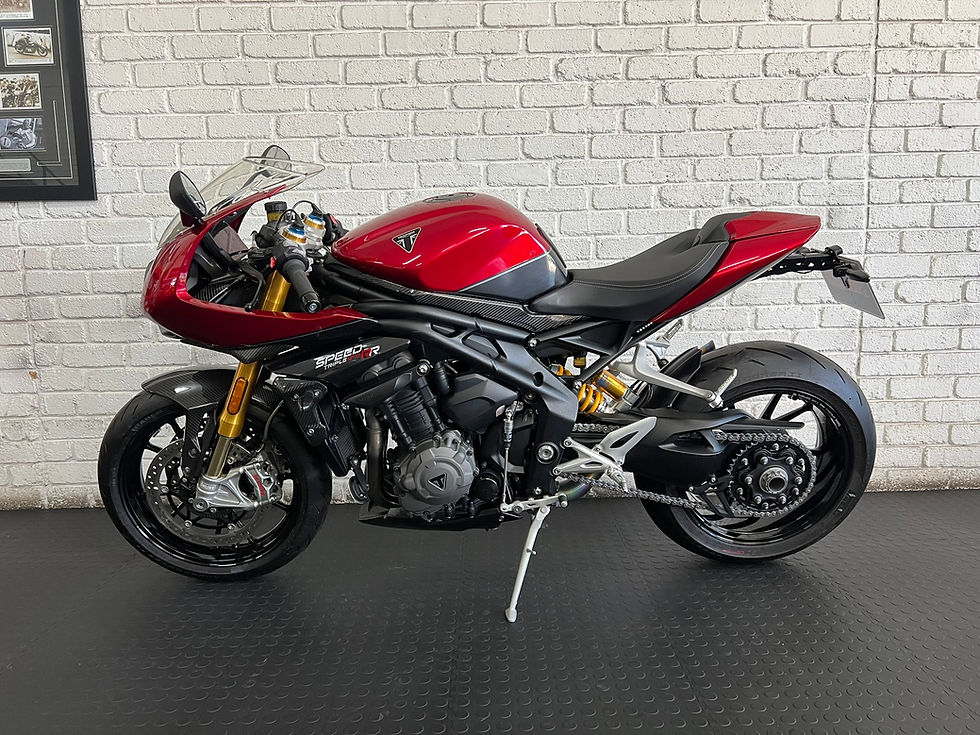 Triumph Speed Triple 1200 RR red naked superbike side view South Africa