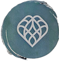 The logo for A Bedazzling Clean LLc, A teal circle with a silver line drawing of a heart