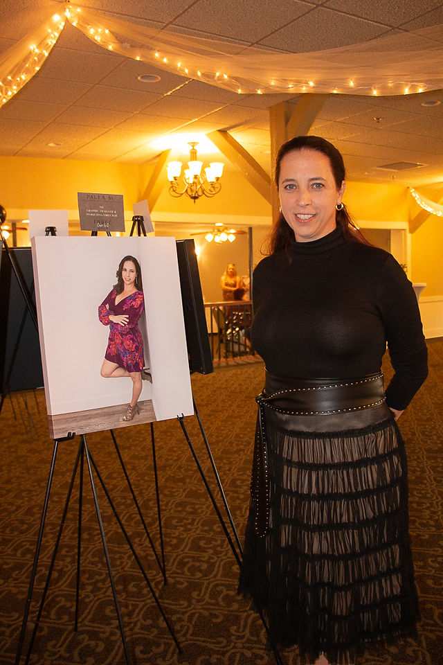 Woman in black dress with her over 40 portrait