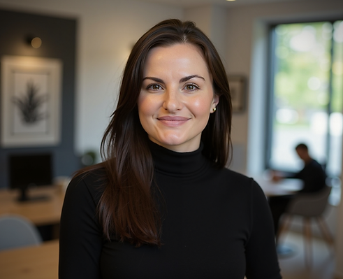 Sarah Kingsburgh Belmont NC Real Estate Agent stands in her office in downtown Belmont