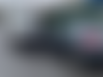 Minor collision between van and car. Generated by ChatGPT.
