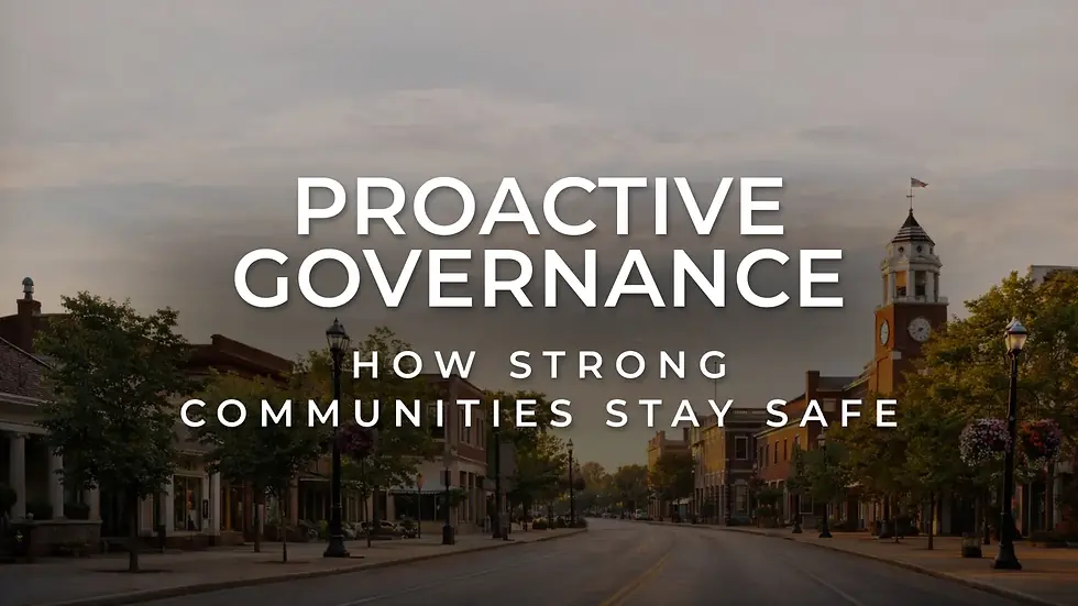 Quiet downtown streetscape with a historic municipal building at sunrise, representing proactive governance, public safety, and well-maintained community infrastructure.
