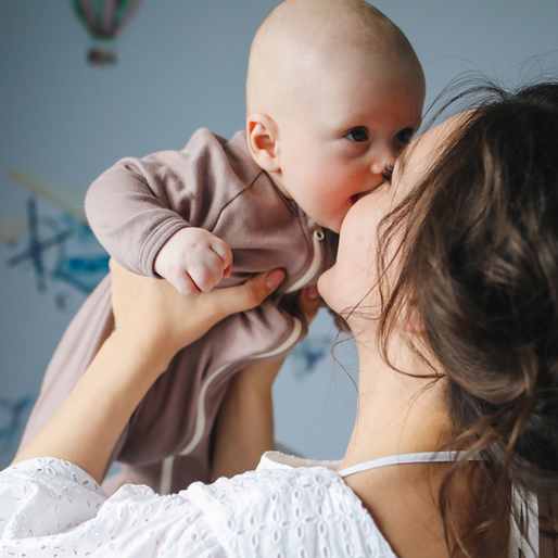 Mum and baby having kisses