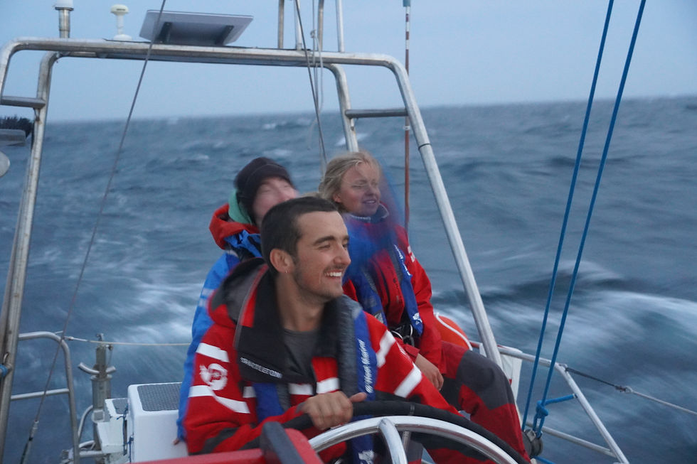 Nathan Having a shot at the wheel in the big waves