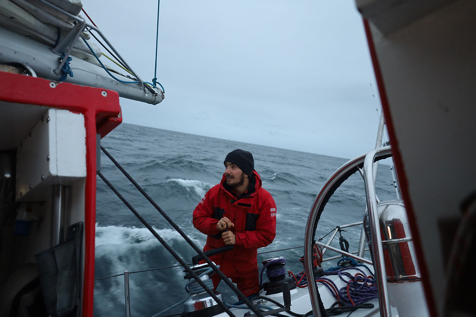 Nathan keeping the boat fast in the Strait of Belle Isle