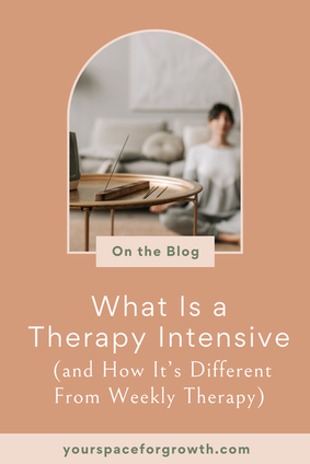 Woman sitting on the floor in a calm living room space with an incense holder in the foreground, representing mindfulness and a holistic therapy intensive.