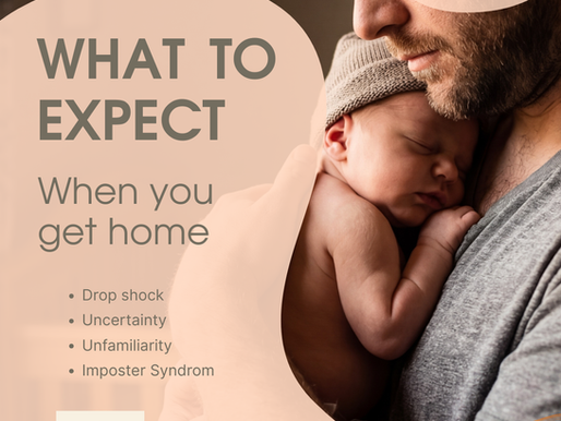 Daddy snuggling newborn baby