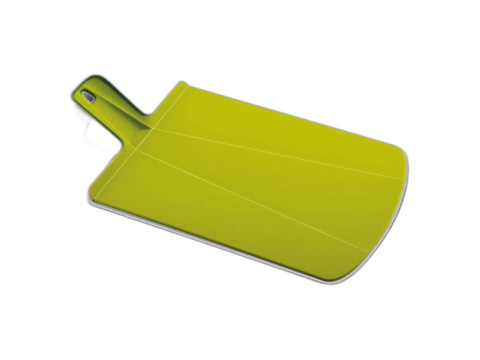 Joseph Joseph Chop2Pot Plus Folding Chopping Board on a cream product tile