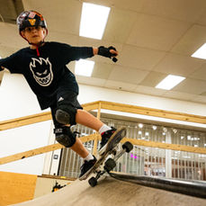A skateboarder sakteboarding in North Shore Bike Park