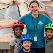 An after-school care provider and her children at North Shore Bike Park