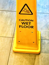 yellow-mobile-warning-cone-caution-wet-slippy-fl-2021-08-30-15-03-34-utc.jpg