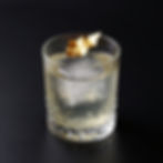 Clear cocktail with gold leaf