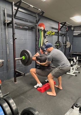 tage squat.jpg
