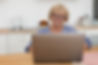 senior-woman-having-videocall-with-her-family.jpg