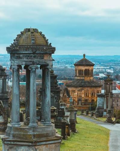 Close up details of ornate Victorian gravestones in Glasgow Necropolis