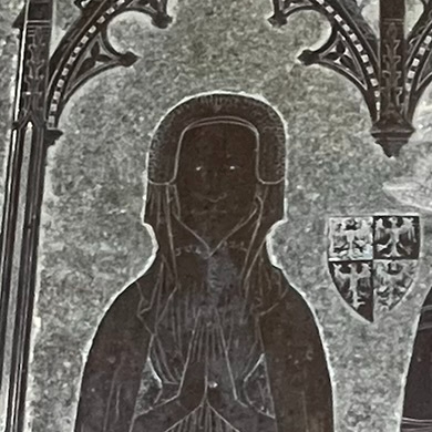 Face of an early fifteenth century lady from a brass
