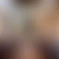 Interior of church looking towards the chancel with aisles left and right and niche above the chancel arch