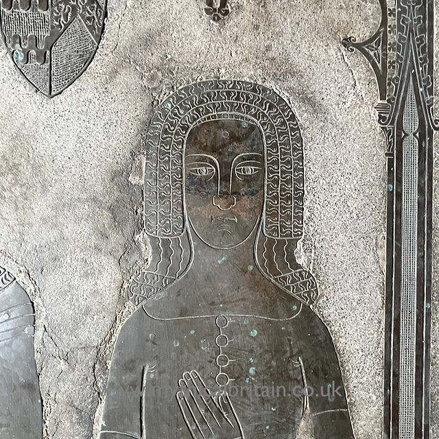 Face of medieval lady from a brass